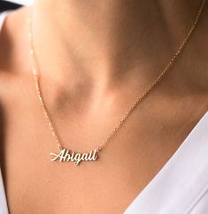 Silver Name Necklace, Personalized Jewelry, Custom Name Jewelry, Personalized Gift, Mothers Day Gift, Gift for Mom, Gifts This personalized name necklace is a perfect gift for birthday, anniversary, Christmas, bridesmaid, graduation, wedding, engagement, best friend, mom and sisters. DIMENSION * Upper Case: 8mm * Lower Case : 6mm MATERIAL * Pendants and Chains are 925 Sterling Silver COLOR * Silver & Gold & Rose Gold GIFT BOX * Each order will come in Jewelry Box. Cheap Gold Custom Necklace For Mother's Day, Silver Name Necklace, Rose Gold Gifts, Sterling Silver Name Necklace, Gold Gift Boxes, Jewelry Personalized, Mom And Sister, Name Jewelry, Mom Gifts