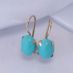 Unique Green Turquoise Earrings, made of 14K Solid Yellow Gold, Oval Shaped, Fine Jewelry for Women, Handmade By AditaGold.  These beautiful handmade oval green turquoise earrings are made of 14K yellow gold and are carefully handcrafted at my workshop in Israel.  Turquoise is December's birthstone, and these solid gold turquoise earrings will be perfect for any occasion. They are classic and elegant and will add a beautiful sparkle to a day or evening look.  Item details   * A pair of earrings. Turquoise Drop Earrings For Formal Occasions, Turquoise Pierced Earrings For Formal Occasions, Turquoise Pierced Earrings For Formal Events, Oval Turquoise Earrings For Anniversary, Turquoise Oval Earrings For Anniversary, Turquoise Earrings With Lever Back Ear Wires As Gift, Turquoise Earrings With Lever Back Ear Wires For Gifts, Formal Turquoise Pierced Earrings, Turquoise Cabochon Earrings For Formal Occasions