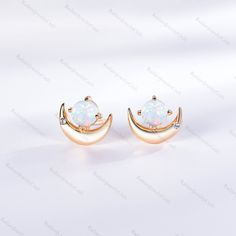 White Fire Opal Stud Earring Black German Fire Opal Post Rainbow Opal Earring 4.5mm Small Petite Stud Gift For Her Vintage Glass Opal Radiant Jewelry takes pride in offering handcrafted engagement rings that undergo rigorous quadruple-checks to ensure the highest quality. PRODUCT INFORMATION >Metal: SOLID 10K / 14K / 18K GOLD /S925 (can be made in white/rose/yellow gold) >Main Stone *Center Stone: White Fire Opal *Size & Shape: 4.5mm Round Cut >Side Stones: *Center Stone: Cubic Zircon / Diamond Elegant Rose Gold Half Moon Jewelry, Celestial Style Pierced Rose Gold Jewelry, Celestial-style Pierced Rose Gold Jewelry, Celestial Rose Gold Pierced Jewelry, Rose Gold Round Crystal Earrings For Pierced Ears, Rose Gold Round Crystal Earrings, Elegant Crescent Moonstone Jewelry, Elegant White Crescent Earrings, White Half Moon Celestial Jewelry