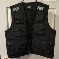 Xl Section Eight “Joey Jordison” Black Tactical Vest Brand New Black Military Vest For Outdoor Activities, Black Utility Vest For Outdoor Activities, Black Military Vest With Pockets, Black Techwear Vest With Multiple Pockets, Black Utility Vest With Cargo Pockets, Black Techwear Vest With Cargo Pockets, Black Vest With Multiple Pockets For Streetwear, Black Streetwear Vest With Multiple Pockets, Black Hunting Outerwear With Pockets