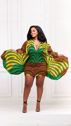 Adjwoa African Print Mini Dress is perfect for formal events, like date night at an upscale restaurant, a party, a wedding and so much more. The fabric and cut of the dress will give you that “snatched” look that you love. The dramatic sleeves adds a fierce and flirtatious look. The green, yellow and brown print is a bold and vibrant print that looks beautiful on all skin tones. Perfect for The Green Adjwoa Mini Dress is perfect for all sorts of functions. Girls night out Resort Casual hangouts Multicolor A-line Party Dress, Green Mini Dress For Wedding, Elegant Multicolor Mini Length Dresses, Elegant Multicolor Dresses For Night Out, Multicolor V-neck Formal Dresses, Green Long Sleeve Mini Dress For Wedding, Fitted Multicolor V-neck Dress For Party, Fitted Multicolor Date Night Dresses, Multicolor Long Sleeve Gown For Party