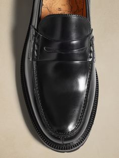 A time-honored classic, this classic loafer comes to life, ready for all seasons with an Italian leather construction in rich tones.  Leather uppers.  Rubber outsoles.  Made in Portugal.  Whole and half sizes.