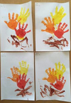 four handprints on paper with different colors and shapes in the shape of hands