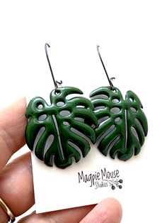 Layered enamel glass fused to copper. Includes drop Sterling earrings. Leaves measure 1 1/2 inches in height. Total length Earwires 2 inches. These earrings have a nice weight to them. Handle as glass. Handmade in Seattle, Wa. Adjustable Enamel Earrings With Ear Wire, Monstera Leaf Earrings, Alpine Green, Leaf Earring, Customer Gifts, Holiday Wrap, Enamel Earrings, Green Enamel, Monstera Leaf