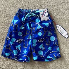 Boys Swim Shorts Size 4t Playful Blue Swim Trunks For Summer, Fun Blue Swim Trunks For Beach Season, Fun Blue Shorts For Vacation, Playful Blue Shorts For Beach Season, Playful Blue Beach Shorts, Fun Blue Beach Shorts, Blue Swim Trunks For Beach Playwear, Fun Blue Bottoms For Vacation, Playful Blue Bottoms For Beach Season