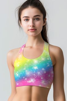 Get moving in our vibrant Bright Story bra. Designed with a colorful, rainbow-like print with a shimmer effect, this cute sports bra brings some magic into your everyday routine. Crafted from sweat-wicking, breathable, lightweight fabric, this racerback provides a smooth feel and creates a comfy shape. This fully-lined bra keeps your chest covered in tough, sweaty sessions. Amazing choice for yoga, intensive workouts as well as home lounging.THE EXCLUSIVE PLACEMENT OF THE PRINT HIGHLIGHTS THE ORIGINALITY OF THE DESIGNPrices are inclusive of all taxes. FREE US SHIPPINGDesigned, printed and sewn in Miami, FL Care and Details Pullover style Elastic band Fully lined Seamless for added comfort Breathable. Moisture-wicking properties True to size Printed Stretch (82% microfiber poly, 18% spandex Mommy And Me Swimwear, Sporty Crop Top, Cute Sports Bra, Neon Dresses, Sport Bikinis, Girls Lace Dress, Mommy And Me Dresses, Girls Unique, Everyday Routine