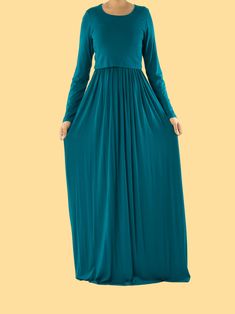 This Super Soft Nursing Modest maxi dress is perfect for breastfeeding mamas. Made with love from very soft rayon jersey fabric, it is breathable and ideal for warm weather. Its beautiful long sleeve style provides a modest look that's perfect for any occasion. 60inch length Rayon fabric Machine washable. Modest Flowy Maxi Dress With Empire Waist, Modest Green Flowy Maxi Dress, Modest Empire Waist Maxi Dress, Spring Maternity Maxi Dress Floor-length, Spring Maternity Floor-length Maxi Dress, Blue Maternity Maxi Dress, Fall Stretch Full-length Maxi Dress, Blue Maxi Length Maternity Dress, Green Maxi Dress For Fall