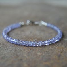 These tanzanite beads are very nicely transparent and a light shade of blue violet. Sterling silver lobster claw clasp Choose 6 1/2 or 7 inches Tanzanite Beads, Tiny Necklace, Silk Necklace, Shade Of Blue, Garnet Necklace, Gem Necklace, Dainty Bracelets, Rough Opal, Black Spinel