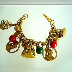 1950s Coral Charm Bracelet With All The Charms You Need In The World Everything You Need In A Charm Bracelet Beautiful, Elegant, Very Well Kept In Beautiful Vintage Condition Vintage Items Are Sold As Is Vintage Brass Gold Bracelet Gift, Vintage Brass Bracelet For Gift, Victorian Bracelets With Vintage Charm As Gift, Victorian Style Bracelet With Vintage Charm For Gift, Vintage Brass Gold Bracelet For Gift, Vintage Gold Bracelets With Charms, Vintage Brass Bracelet Gift, Gold Vintage Bracelets With Charms, Vintage Jeweled Bracelets For Collectible