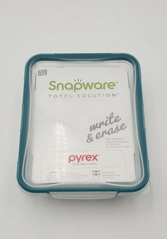 a plastic container with white and blue trim on the lid that says snowware total solution