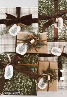 four wrapped presents with brown ribbons and bows on them, all tied up in different patterns