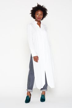 Somewhere between a shirt and a dress, this stunner can be worn in a slew of ways: over pants of any kind, with leggings, and for the very bold, with no pants at all. Casual Workwear Blouse With High-low Hem, Casual High-low Hem Blouse For Work, Long Cotton Shirt Dress For Work, Elegant Shirt Dress With Relaxed Fit And Shirttail Hem, Elegant Shirt Dress With Shirttail Hem And Relaxed Fit, Elegant Shirttail Hem Shirt Dress With Relaxed Fit, Fall Workwear Shirt Dress With Asymmetrical Hem, Long Shirt Dress For Fall Daywear, Chic Long Cotton Shirt Dress