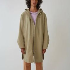 Lightly Worn Hooded A-Line Parka In Beige Twill. An Everyday Essential! From The Men’s Spring 2018 Collection - Looks Great On Women Too As An Oversized Trench. Made From A Heavyweight Cotton, Feels Very Consistent. Lots Of Details: Adjustable Drawstring Hood And Waist, 2 Front Pockets And Extended Side Vents With Buttons. Double Ended Front Zip Closure And Adjustable Cuffs With Hidden Snap Buttons. Half Lined With Lined Sleeves. Retailed At $800 New. Comes With Original Cotton Garment Bag. Marked Size 44 (Xs - 175cm) Great Condition, Worn A Couple Times. Has A Little Stain Next To One Of The Pockets As Pictured. Hardly Noticeable. Spring Khaki Hooded Jacket With Double-lined Hood, Hooded Spring Outerwear For Everyday, Spring Oversized Outerwear With Adjustable Hood, Oversized Outerwear With Adjustable Hood For Spring, Everyday Hooded Outerwear For Spring, Spring Everyday Hooded Outerwear, Spring Oversized Parka With Adjustable Hood, Urban Outerwear With Adjustable Hood For Spring, Beige Spring Outerwear With Double-lined Hood