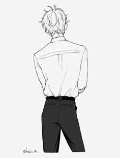 the back view of a person in a shirt and pants, looking down at something