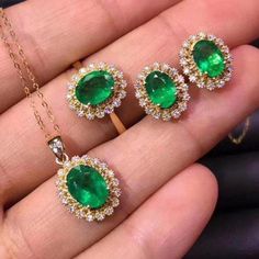 Welcome to Elegant Art Jewelry!  Stone: Natural Emerald Stone Size: ( Ring, 5mmx7mm ), ( Earring, 4mmx6mm ), ( Pendant, 5mmx7mm ) Side Stone Shape: Oval Cut Metal: 925 Sterling Silver Personalization: 9K/14K/24K/GOLD/SILVER/PLATINUM/ROSE-GOLD/WHITE GOLD. (Contact me)  Emerald Earring, Emerald Ring, Emerald Pendant, Emerald Cuff Pendant, 925 Sterling Silver Pendant, Round Shape Pendant, Emerald Pendant, Emerald Engagement, Open Design Pendant, Emerald Round, Emerald Natural, Green Emerald, Green Emerald Jewelry Set, Emerald Earring, Silver Pendent, Engagement Ring Emerald, Engagement Necklaces, Pear Shaped Pendant, Necklace Luxury, Victorian Pendants, Platinum Rose Gold