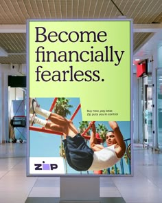 a sign that says become financially fearless in front of an airport lobby with palm trees