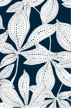 an abstract pattern with dots and leaves