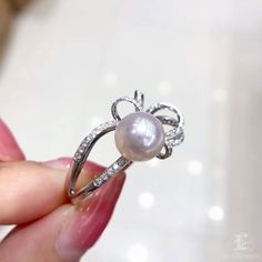 Highline: Famous Style Product Information OriginJapan MaterialAkoya Pearl, 18k Gold w/ Diamond Dimensions- Pearl Shaped: Round Size: 9-9.5 mm Quality: AAA Nacre: Very Thick Color: Rose overtone Luster: Very High Accessories Metal: 5.7ct of 18k White Gold Other: 0.45ct of SI Quality Natural Diamond Diamond White Pearl Ring With Brilliant Cut, Fine Jewelry Diamond White Pearl Ring With Prong Setting, Diamond Pearl Ring With Brilliant Cut For Promise, Diamond White Pearl Ring With Prong Setting, Fine Jewelry White Gold Pearl Ring With Prong Setting, White Pearl Ring With Center Stone For Fine Jewelry, White Gold Pearl Ring With Diamond Center Stone, White Gold Pearl Ring With Prong Setting, White Diamond Ring With Diamond Accents