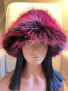 This beautiful incredibly soft faux fur hat is a must have for the fall and winter season.It is stylish and warm and can be dressed up or down. The head circumference of the hat is about 22-23inches (56-60cm) so almost everyone should fit :)  The hat is made out of Vegan Fur and is super soft and fluffy:) For any different color requests please send me an email:)