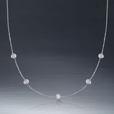 Ross-Simons - 1.00ct t. w. Bezel-Set Diamond Station Necklace in 14kt White Gold. 20". The classic look of a bezel-set diamond station necklace. Our must-have design is always in style - any outfit, any occasion. Totaling 1.00 carat, five round brilliant-cut diamonds spark a 14kt white gold cable chain. This is the piece you've been seeking to complete your collection. Lobster clasp, diamond station necklace. Diamond birthstones are the perfect gift for April birthdays. Classic Platinum Diamond Necklace With Bezel Setting, Classic Round Diamond Station Necklace, Classic Round Solitaire Necklace With Pave Setting, Luxury Round Station Necklace With Single Cut Diamonds, Luxury Station Necklace With Single Cut Diamonds, Formal Round Station Necklace With Bezel Setting, Fine Jewelry Station Necklace With Single Cut Diamonds, Classic Round Station Necklace For Formal Occasions, White Gold Station Necklace With Round Diamond