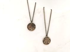 Men Medallion coin necklace, Men gold Disc necklace, Chain necklace Guys Gift Men Medallion coin necklaces are so much in Trend! You can wear it with any outfit and it looks great layered with other necklaces too. Guaranteed to become a favorite piece. D E T A I L S: ❤ It features a beautiful antique gold/black plated over brass coin pendant of Republique Francaise ❤ It is suspended from a delicate antique Chain ❤ It closes with an antique Lobster clasp. coin size: 22 mm in diameter In the drop Necklace Guys, Necklace Men Gold, Gold Disc Necklace, Necklace Men, Gold Disc, Black Plates, Disc Necklace, Coin Necklace, Coin Pendant