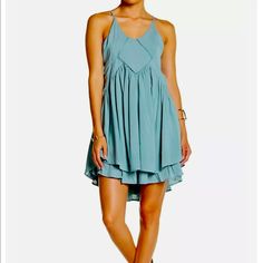 Women's Racerback Dress Scoop Neck Sleeveless High-Low Hem Solid Aqua Light Blue Sleeveless Mini Dress With Adjustable Straps, Flowy Cami Beach Dress, Flowy Cami Dress For The Beach, Light Blue Sleeveless Dress With Spaghetti Straps For Summer, Casual Flowy Halter Neck Sleeveless Dress, Flowy Backless Casual Dress, Casual Flowy Backless Dress, Light Blue Sleeveless Beach Dress With Spaghetti Straps, Blue Cami Sundress For The Beach