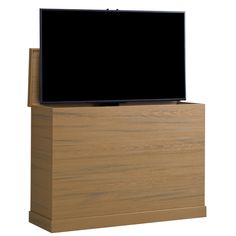 a flat screen tv sitting on top of a wooden stand