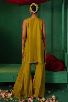 Green silk kurta with floral thread embroidery embellished by sequins and beads. Comes with bell bottom pant. - Aza Fashions Sleeveless Raw Silk Sets With Resham Embroidery, Sleeveless Raw Silk Sets For Eid, Kurta Patterns, Studio Green, Types Of Work, Beaded Neckline, Bell Bottom Pants, Green Silk, Embroidered Silk