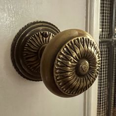 the door knobs are brass in color