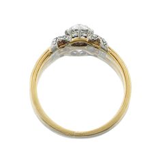 Vintage Old European Cut Diamond Ring in Two-Tone Setting The Maisie ring is an authentic vintage ring from the Edwardian era circa 1910. The ring centers a GIA-certified 0.50-carat Old European Cut diamond of J color, VS2 clarity. The stone is set in an 18kt yellow gold and silver setting with detailed, ribbon-like me Formal Diamond Ring With Rose Cut Round Stone, Formal Rose Cut Diamond Ring With Round Stone, Formal Rose Cut Diamond Ring, Timeless Diamond Marriage Rings, Timeless Diamond Ring For Marriage, Heirloom Diamond Ring With Vvs Clarity, Timeless Brilliant Cut Diamond Marriage Ring, Heirloom Halo Setting Ring For Marriage, Timeless Brilliant Cut Diamond Ring For Marriage