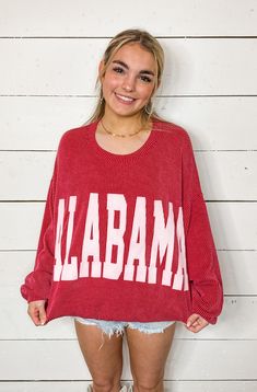 The Alabama Crimson Long Sleeve Top is oh-so comfy and oversized. With a crewneck style and long drop shoulder sleeves, you'll be feeling cozy and stylish. Plus, in the bold and bright Alabama crimson red, you'll stand out in any crowd. It's a must-have for any fan or fashionista! Oversized Red Sweater With Letter Print, Red College Sweater With Ribbed Cuffs, Red Letter Print Sweater For Fall, Red Long Sleeve Sweater For College, Red Relaxed Fit Sweater With Letter Print, Oversized Red Sweatshirt With Ribbed Cuffs, Trendy Red Sweater For Loungewear, Red Trendy Sweater For Loungewear, Collegiate Red Sweater For Fall