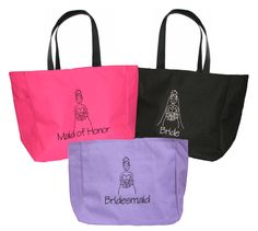 three monogrammed tote bags in different colors