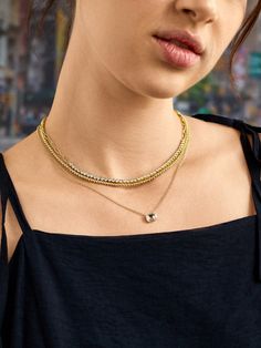 Creating a layered look just got so much easier thanks to the Kenna Layered Necklace. Crafted with different and unique gold chains, this triple chain necklace does the job of three styles in one. Glass stones interspersed on each chain create a light touch of sparkle, giving this accessory an understated yet still eye-catching glow. Triple Chain Necklace, Light Touch, Tennis Necklace, Prime Time, Gold Necklace Layered, Layered Necklace, Layered Look, Layered Necklaces, Gold Chains