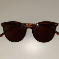 Sunglasses, Never Worn. Comes With Case Casual Brown Polarized Cat Eye Sunglasses, Casual Brown Cat Eye Sunglasses With Polarized Lenses, Casual Tortoiseshell Cat Eye Sunglasses With Mirrored Lenses, Casual Brown Cat Eye Sunglasses For Vacation, Casual Brown Sunglasses For Travel, Casual Tortoiseshell Sunglasses For Everyday, Classic Tortoiseshell Sunglasses For Beach, Brown Wayfarer Sunglasses For Vacation, Brown Mirrored Sunglasses For Vacation