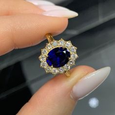 This Ring Was Especially Designed For Princess Diana To Match The Color Of Her Eyes... It has its own royal story and since then has been an inspiration for many woman as an identification of princess Diana's absorbing personality - Ring details - Center Stone - 2,00 ct Oval Cut Blue Sapphire Gemstone - Check out the Amazing Deep Blue Color in the video Excellent Graded Cut Side Stones - 1,40 ct Total Round Brilliant Cut Natural Diamonds Total - 14 Diamonds of 0,10 ct Each  Color And Clarity - D-E-F VVS1 Band - 18K Yellow Gold  Available Also In - Rose Gold 18K And White Gold 18K  Center Stone can be changed according to your own budget. All you have to do is send us a private message / call and we will offer you in the most professional way options of other center stones from our own and Dazzling Oval Yellow Gold Sapphire Ring, Gold Sapphire Diamond Ring With Halo Design, Luxury Oval Lab-created Sapphire Ring, Oval Yellow Gold Sapphire Ring With Halo Design, Oval Sapphire Ring With Halo Design In Yellow Gold, Exquisite Oval Sapphire Ring With Diamond, Gold Oval Sapphire Ring With Brilliant Cut, Dazzling Oval Sapphire Ring, Elegant Gold Ring With Lab-created Sapphire