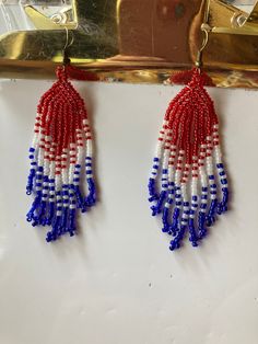 Beaded United States flag earrings. Perfect for anyone specially somebody patriotic. Patriotic Earrings For 4th Of July, Patriotic 4th Of July Earrings, Handmade Red Beaded Earrings For 4th Of July, Blue Patriotic Earrings For Independence Day, Patriotic Dangle Earrings For Independence Day, Patriotic Blue Earrings For Independence Day, Patriotic Drop Earrings For 4th Of July, Patriotic Dangle Jewelry For Independence Day, Patriotic American Flag Jewelry For 4th Of July