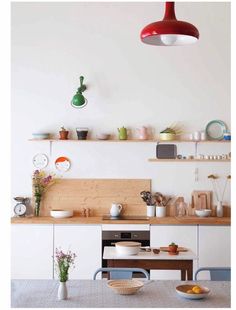 the kitchen is clean and ready to be used for dinner or lunchtime, but it's not too crowded