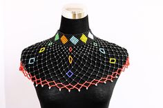 African wedding necklace, Zulu necklace, Beaded shawl necklace, African jewelry, Masai necklace, Bridesmaid necklace, Wedding gift 100% handmade using fine beads. Closure: ball joint Color: multicolored 3-5 days delivery via DHL Express The shipping fee is for the first item only and additional necklaces ship for free. To continue shopping click here: timanacrafts.etsy.com Multicolor Beaded Necklace For Wedding, Multicolor Beaded Chain Necklace For Wedding, Multicolor Handmade Choker For Wedding, Multicolor Beaded Choker For Wedding, Wedding Multicolor Beaded Chain Beads, Bohemian Beaded Bib Necklace For Wedding, Elegant Multicolor Jewelry With Tiny Beads, Bohemian Beaded Choker Necklace For Wedding, Long Beaded Necklace With Large Beads For Wedding