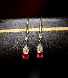 *Condition: Brand new *Center Stone: Natural Red Spinel, Cushion Cut, approx 1.6ct total, 5.5x4.5mm *Side stones: Natural White Diamond Round-cut (VS1 clarity and F color) *Earrings Dimension: 3.5 x 26 x 3mm *Metal Purity: Can be select Each piece is made-to-order with care and special attention to detail. all items are made with conflict-free diamonds and gems. Size: made to order The item will be gift wrapped and shipped. ------------------------------------------------------------------- Avai Luxury Red Ruby Earrings, Exquisite Red Ruby Earrings, Exquisite Ruby Red Earrings, Luxury Red Earrings For Party, Luxury Red Earrings For Formal Occasions, Luxury Red Party Earrings, Elegant Valentine's Day Jewelry With Matching Earrings, Pink Oval Ruby Earrings, Rose Gold Ruby Earrings For Gifts