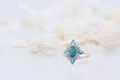 Yellow Gold Australian Opal Cluster Ring, Topaz Cluster Ring, Unique Birthstone Engagement Ring, 14k 18k Gold Antique Ring, Christmas gift by PurpleMayJewellery on Etsy https://www.etsy.com/listing/625113134/yellow-gold-australian-opal-cluster-ring Elegant Multi-stone Topaz Ring In 14k Gold, Luxury Blue Opal Ring For Anniversary, Elegant Cluster Opal Ring, Elegant Multi-stone Blue Topaz Rings, Elegant Blue Topaz Multi-stone Rings, Elegant 14k Gold Multi-stone Topaz Ring, Fine Jewelry Topaz Wedding Ring With Halo Design, Fine Jewelry Topaz Halo Wedding Ring, Fine Jewelry Topaz Ring With Halo Design For Wedding