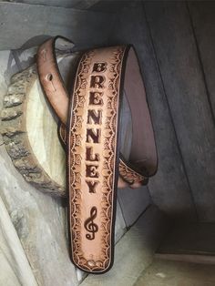 a horse bridle with the name breezey engraved on it's side