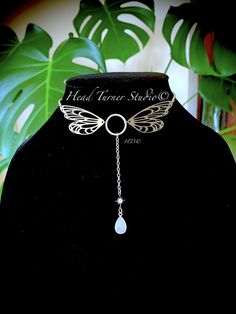 "*✧･ﾟ:*Handmade Silver Mystic Moonstone Flying Fairy Butterfly Wing Lariat Choker*:･ﾟ✧* Perfect for a Fairy Princess or a Fairy Goddess! Create your own Fairy tale by making a statement and turning heads all at the same time! This gorgeous lariat choker is enchanting! *:･ﾟ･ﾟ✧💚 ✧･ﾟ: *✧･ﾟ:* ✨P R O D U C T I O N - T I M E ✨ Each of my lovingly handcrafted pieces is designed, assembled and packaged with the upmost care. Please allow 1-3 business days for production. If you have a specific deadline, Handmade Fantasy Body Jewelry For Festivals, Adjustable Fantasy Necklaces For Cosplay, Fairycore Jewelry For Parties, Adjustable Fantasy Necklace For Cosplay, Adjustable Fairycore Jewelry For Parties, Fairy Style Silver Jewelry For Festival, Silver Fairy Style Jewelry For Festival, Silver Fairy Jewelry For Festivals, Fairy Style Adjustable Wedding Jewelry