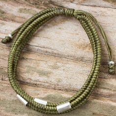 Inspired by the talented hill tribe artisans of Thailand Napapat creates this unique braided bracelet using waxed polyester cord dyed an earthy olive green. This hand crafted bracelet features silver beaded accents and a sliding knot making it the perfect accessory for a casual day out. Cheap Green Braided Bracelets With Adjustable Cord, Cheap Everyday Green Braided Bracelets, Green Braided Bracelet With Sliding Knot, Cheap Trendy Green Braided Bracelet, St Michael Pendant, Pure Gold Jewellery, Mens Jewellery, Green Thread, Marcasite Jewelry