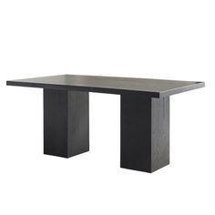 a black table sitting on top of a white floor