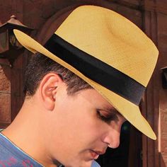 Brand: Gamboa Model: FedoraColor: Light brown Material: Toquilla straw Brim: 7 cm. (2 3/4")Grade: 3 - 4 learn more Sweatband: Anti sweat cotton twill, 3 cm. (1.18") Crown: 11 cm. (4 3/10") Ribbon: Black linen CLASSIC FEDORA: One of our all-time classics. Beautiful fedora Panama hat in a light brown tone. GENUINE PANAMA HAT: This Panama hat is handmade by expert artisans in Ecuador. Made with high-quality toquilla straw. VERSATILE: You can wear it to walk in the city, on your beach holidays, at a Cuban Hat, Poncho Mexican, Panama Hat Men, Poncho Pullover, 4 Grade, Alpaca Socks, Beach Holidays, Alpaca Scarf, Brown Tone