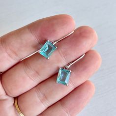 Aquamarine Earrings March Birthstone Aqua Blue Emerald Cut - Etsy Oblong Jewelry With Matching Earrings For Gifts, Oblong Jewelry Set With Matching Earrings As Gift, Jewelry Set With Matching Earrings As A Gift, Blue Rectangular Earrings With Ear Wire, Blue Rectangular Earrings, Blue Rectangular Gemstone Earrings, Rectangular Blue Earrings For Anniversary, Emerald Cut Earrings, Quartz Properties