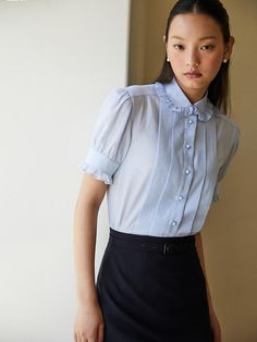 Composition : Cotton 100%Country of Origin : Republic of Korea Semi-formal Light Blue Fitted Top, Light Blue Fitted Semi-formal Top, Fitted Light Blue Semi-formal Top, Fitted Light Blue Top For Semi-formal Occasions, Light Blue Short Sleeve Office Blouse, Blue Feminine Blouse For Work, Feminine Blue Tops For Office, Feminine Blue Tops For The Office, Chic Blue Semi-formal Blouse