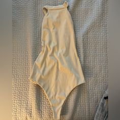 Never Worn Xs Chic Beige Stretch Swimwear, Cream Fitted Swimwear For Party, Fitted Cream Swimwear For Party, Beige Sleeveless Swimwear For Spring, Cream Fitted Sleeveless Swimwear, Casual Beige Swimwear For Spring, Fitted Sleeveless Swimwear For Day Out, Cream Stretch Swimwear For Spring, Spring Cream Stretch Swimwear