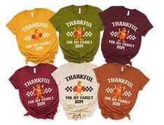 Bring your family together with our Family Matching Thanksgiving Shirts! These funny and festive tees are perfect for creating memorable moments during your Thanksgiving celebration. Ideal as a group gift, these shirts ensure everyone is in the holiday spirit. Product Description: ⇝ Bella and Canvas Brand Shirts ⇝ Unisex Adult Sizing ⇝ Rolled Sleeves in pictures are for styling purposes only ⇝ Props used in photos for are NOT included with purchase ⇝ Please consult the listing image for informat Cute Group Thanksgiving Shirts, Fun Short Sleeve T-shirt For Family Reunion, Fun Custom Print T-shirt For Family Reunion, Funny Short Sleeve T-shirt For Family Events, Family Matching Graphic T-shirt, Family Matching Graphic Print T-shirt For Gatherings, Graphic Tee With Crew Neck For Family Gatherings, Graphic Tee Crew Neck Tops For Family Gatherings, Fun Graphic Print Tops For Family Events