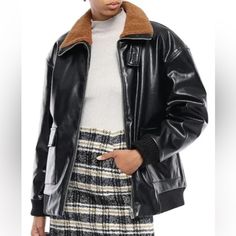 Bomber Jackets Are A Top Trend For 2024 Maje Blouson Black Faux Leather Jacket With Two Front Flap Pockets, Zip Front, And Elasticated Waist And Cuffs. Brown Faux Fur-Trimmed Shearling Collar. Relaxed Fit. Drop Shoulders. Lined Reposhed Because It Does Not Fit Me....Losing Money On What I Spent, No Profit Only Loss So Not Negotiating Much On Price Size: 2 | Medium Chest: 44" Length: 26" Sleeve Length: 23" Colors: Black And Brown Material: 100% Polyester Lining: 80% Polyester, 20% Cotton Conditio Trendy Leather Jacket With Faux Fur Lining For Work, Trendy Workwear Leather Jacket With Faux Fur Trim, Black Fur Coat With Padded Collar For Fall, Black Fur Coat With Pockets For Fall, Winter Workwear Leather Jacket With Faux Fur Lining, Black Biker Jacket With Faux Fur Lining For Work, Brown Leather Jacket With Faux Fur Lining For Work, Chic Black Leather Jacket With Faux Fur Lining, Chic Black Leather Fur Coat